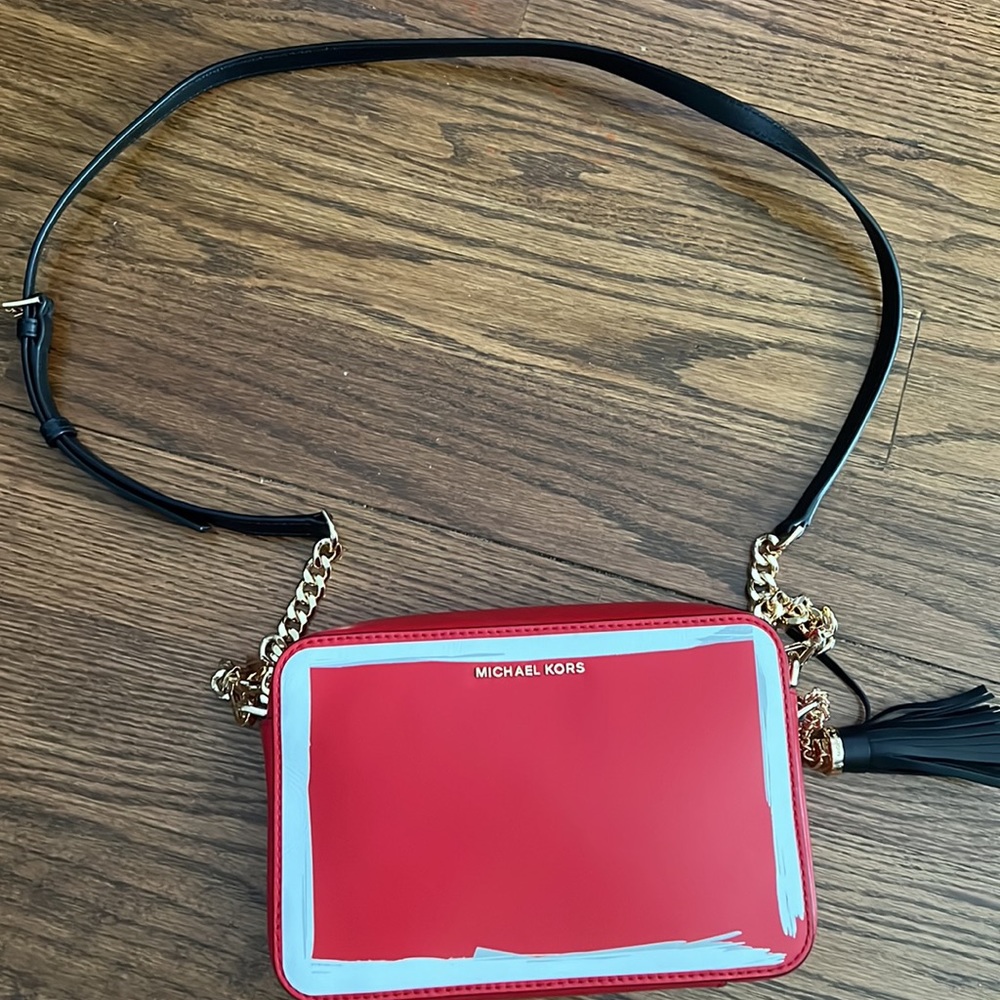 Red Michael Kors crossbody handbag